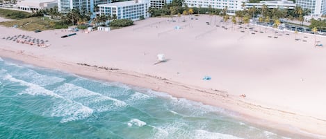 Private beach, white sand, sun-loungers, beach umbrellas