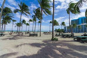 Private beach, white sand, sun loungers, beach umbrellas