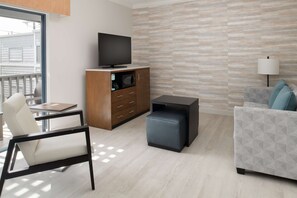 Suite, 1 King Bed, Non Smoking, Balcony | In-room safe, individually decorated, individually furnished, desk
