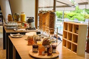 Daily buffet breakfast (EUR 18 per person)