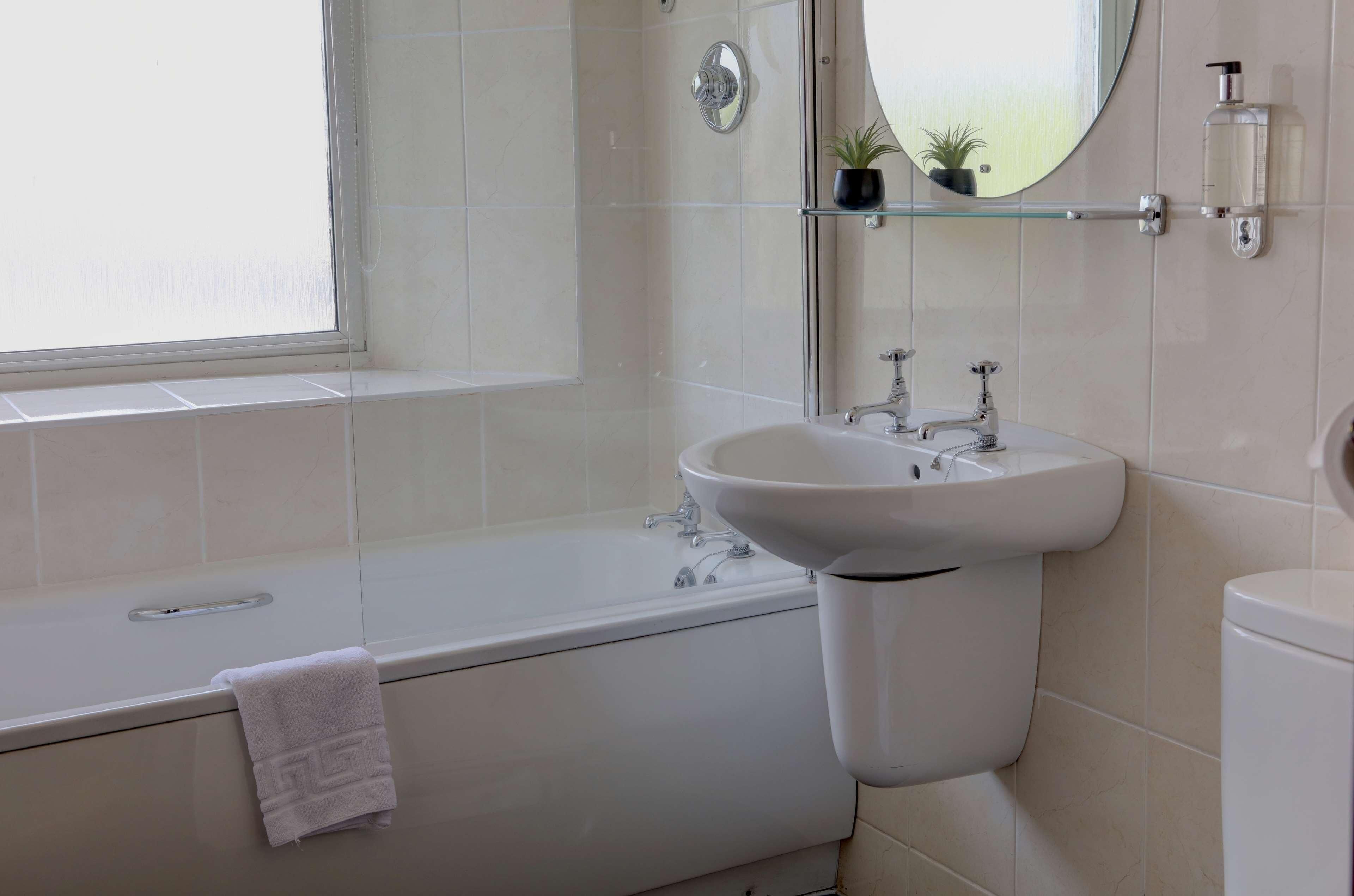 Bathroom | Eco-friendly toiletries, hair dryer, towels