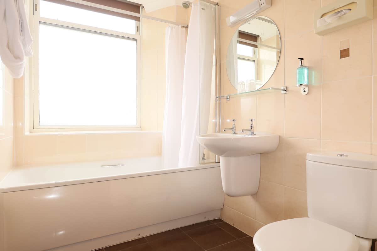 eco-friendly toiletries, hair dryer, towels