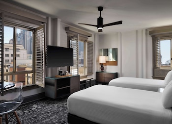 Premium bedding, down comforters, pillowtop beds, in-room safe at The Barnes San Francisco, Tapestry Collection by Hilton
