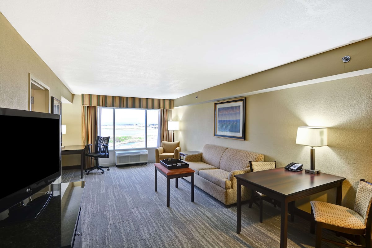 executive suite, 1 king bed, balcony, bay view | desk, laptop workspace, blackout curtains, iron/ironing board