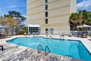 Outdoor pool, open 9:00 AM to 10:00 PM, pool loungers