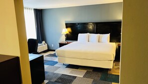 Suite, 1 King Bed with Sofa bed, Non Smoking | Premium bedding, in-room safe, desk, blackout curtains - Magnuson Grand Hotel & Conference Center Tyler (Tyler)