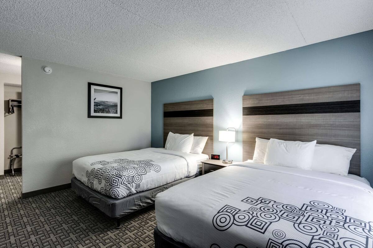 Room, 2 Queen Beds, Non Smoking | Desk, iron/ironing board, free WiFi, bed sheets
