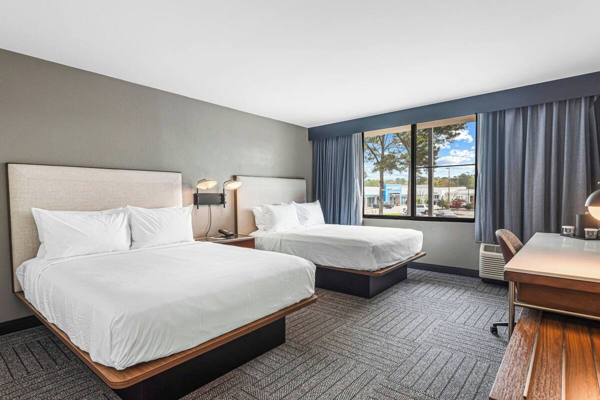 Room, 2 Queen Beds | In-room safe, blackout drapes, iron/ironing board, cribs (free)