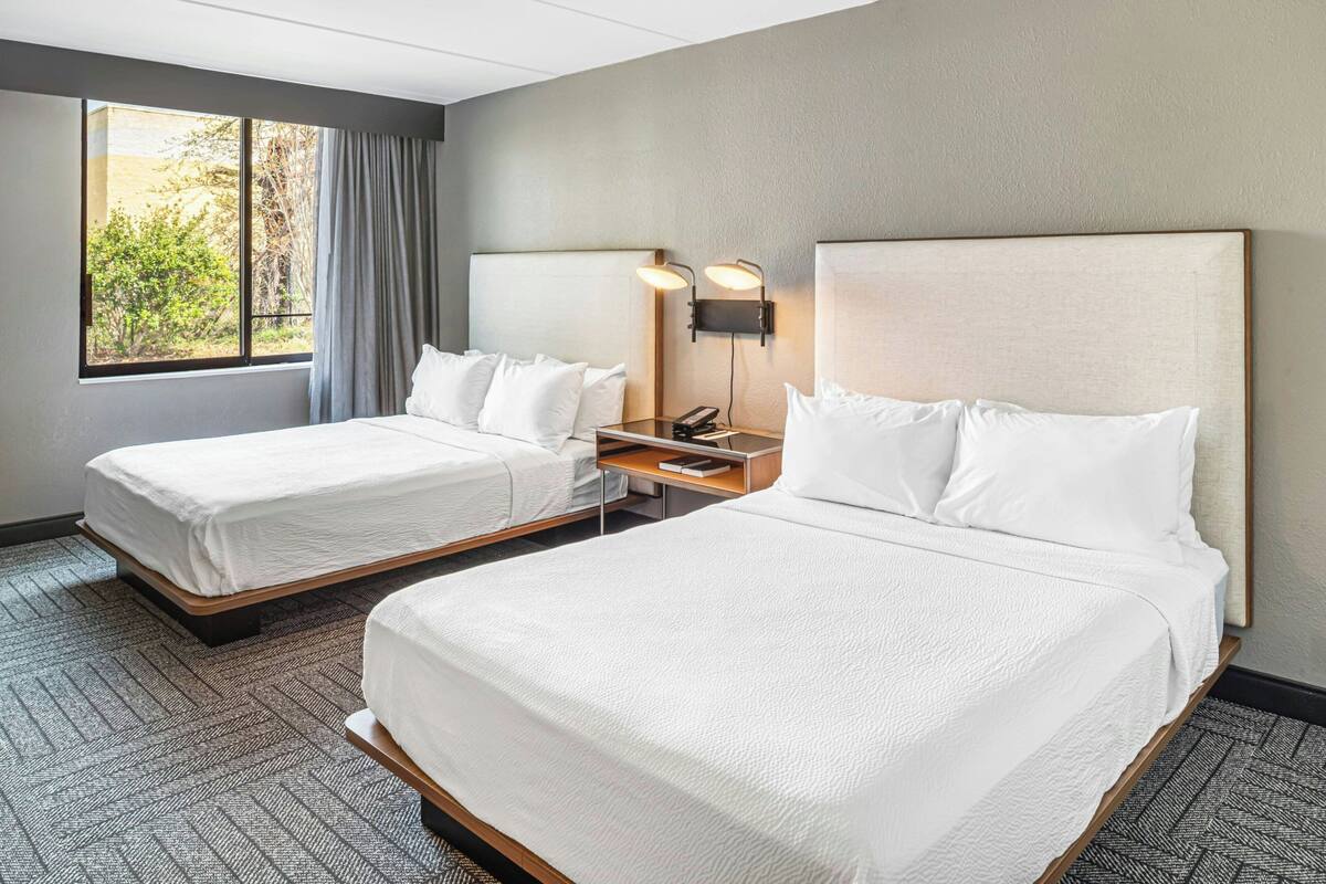 In-room safe, blackout drapes, iron/ironing board, cribs (free)