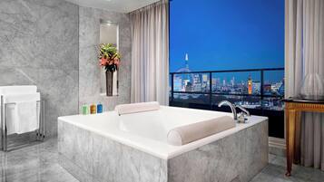 Suite, 2 Bedrooms | Bathroom | Separate tub and shower, eco-friendly toiletries, hair dryer, bathrobes