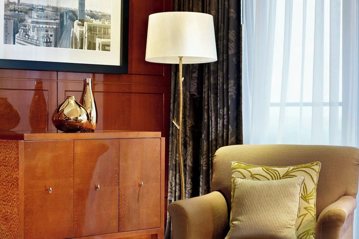 Suite, 1 Bedroom | Living room | 49-inch LCD TV with satellite channels, TV, iPod dock