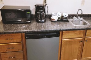 Mini-fridge, microwave, coffee/tea maker, coffee grinder