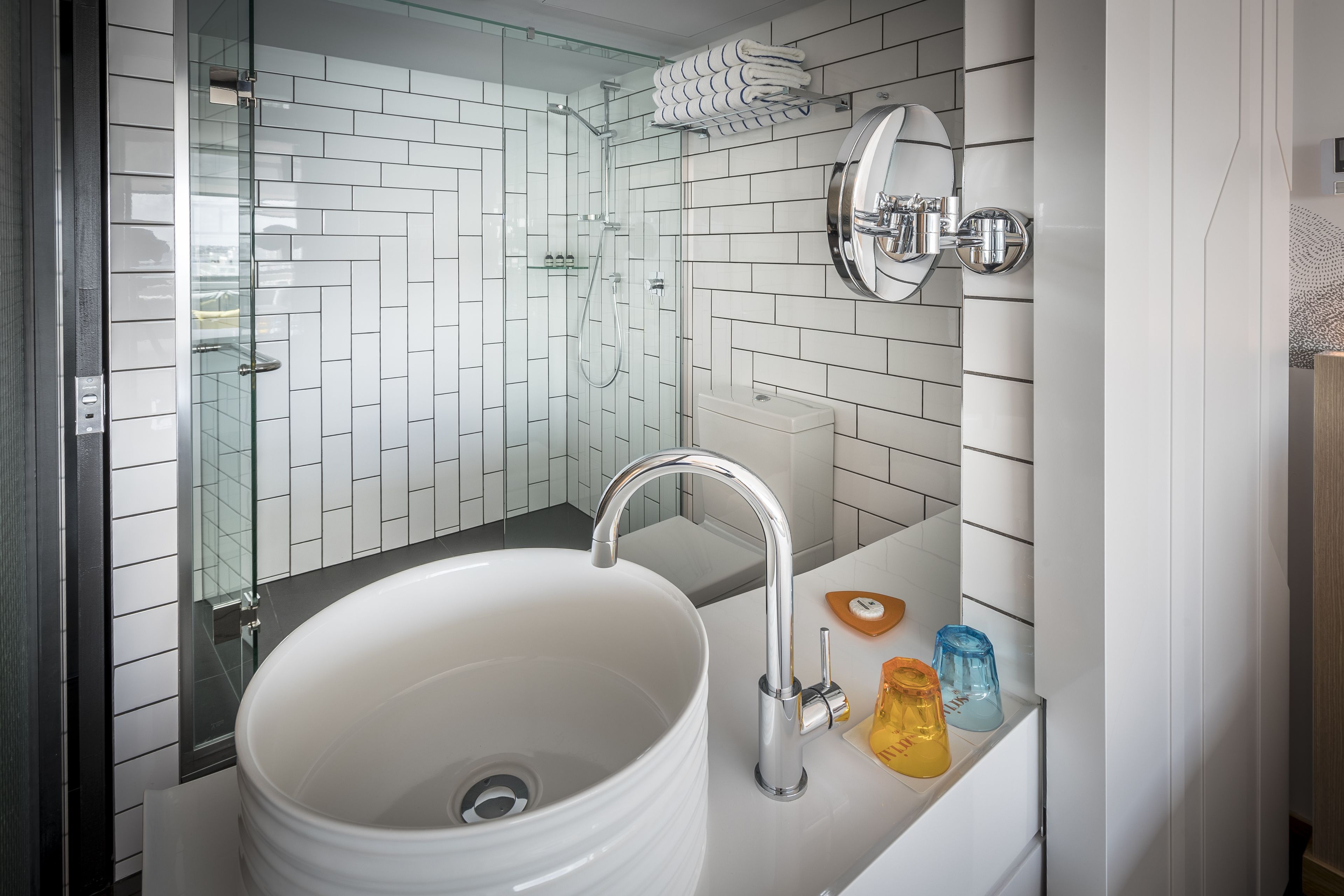 eco-friendly toiletries, hair dryer, bathrobes, slippers