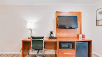 Premium bedding, desk, laptop workspace, blackout curtains