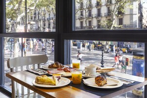 Daily buffet breakfast (EUR 18 per person)