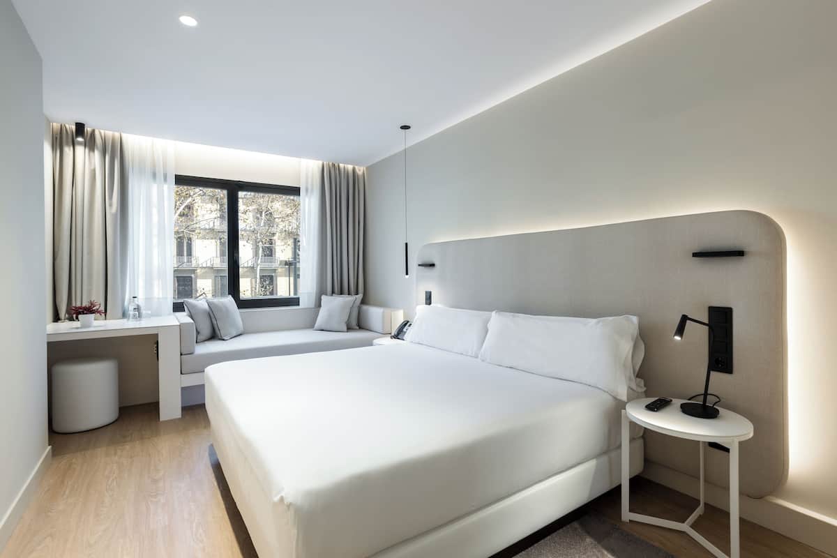 Premium bedding, down comforters, pillowtop beds, minibar