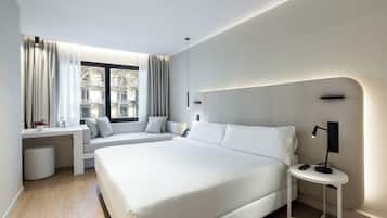 Premium bedding, down comforters, pillowtop beds, minibar