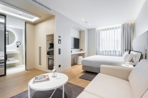 Family Room, 1 King Bed with Sofa bed | Premium bedding, down comforters, pillowtop beds, minibar