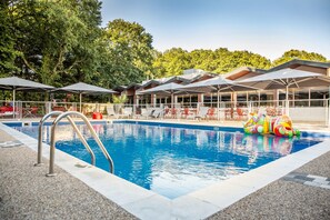 Seasonal outdoor pool, pool loungers