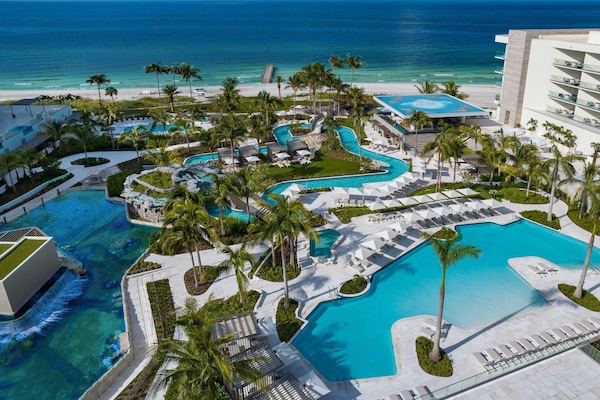 Private beach, white sand, sun loungers, beach umbrellas