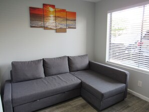 50-inch flat-screen TV with cable channels, TV - Capri Suites Anaheim (Anaheim)