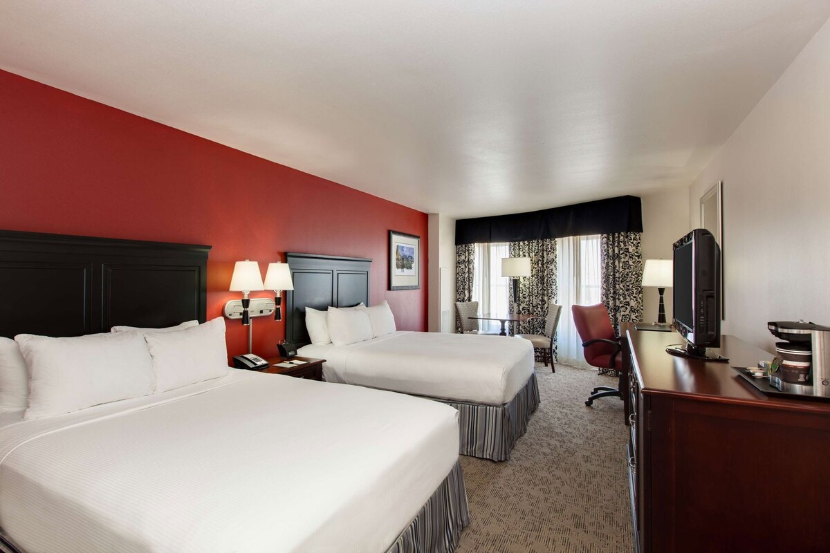 Premium bedding, down comforters, pillowtop beds, in-room safe