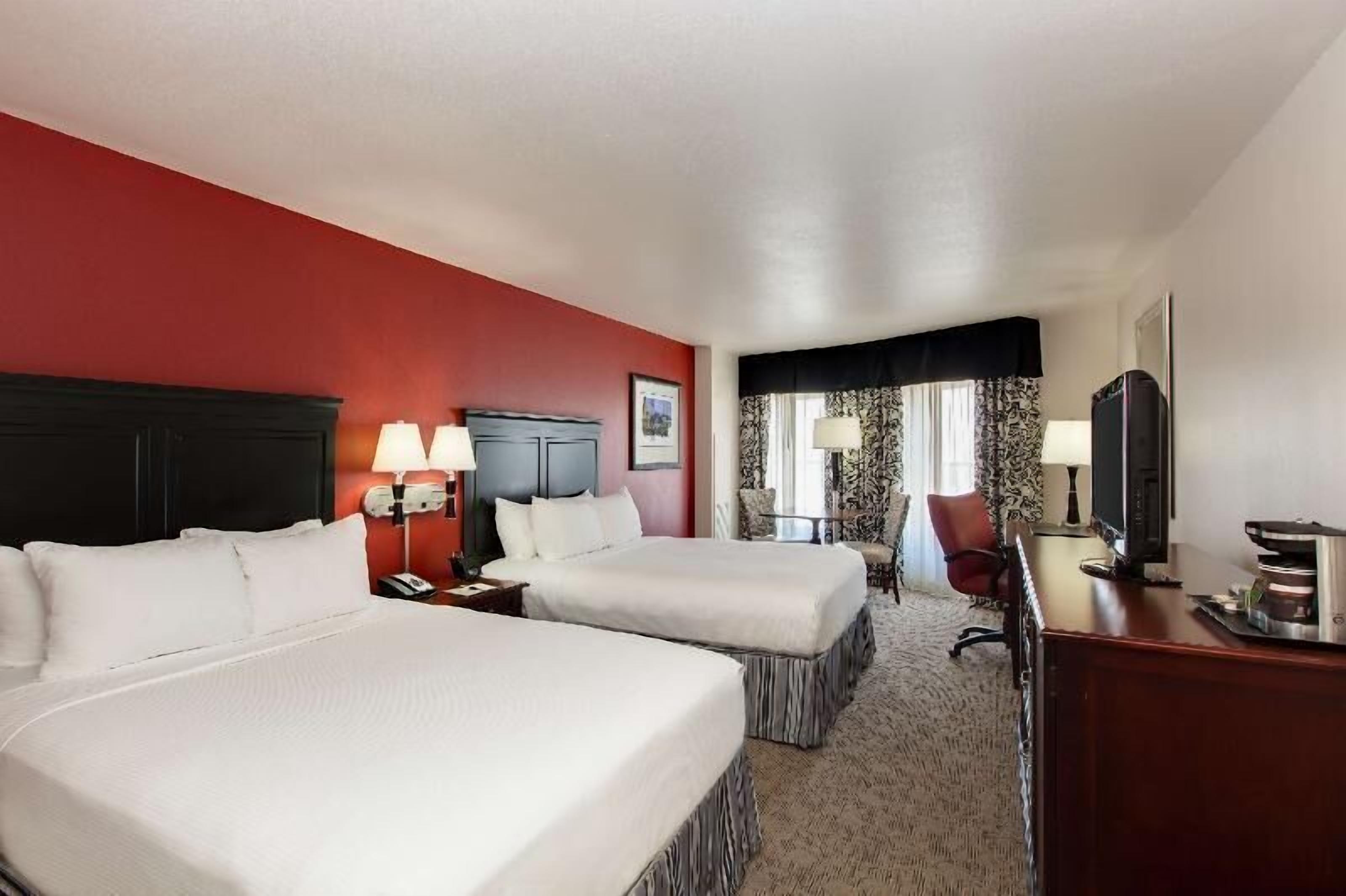 Premium bedding, down comforters, pillowtop beds, in-room safe