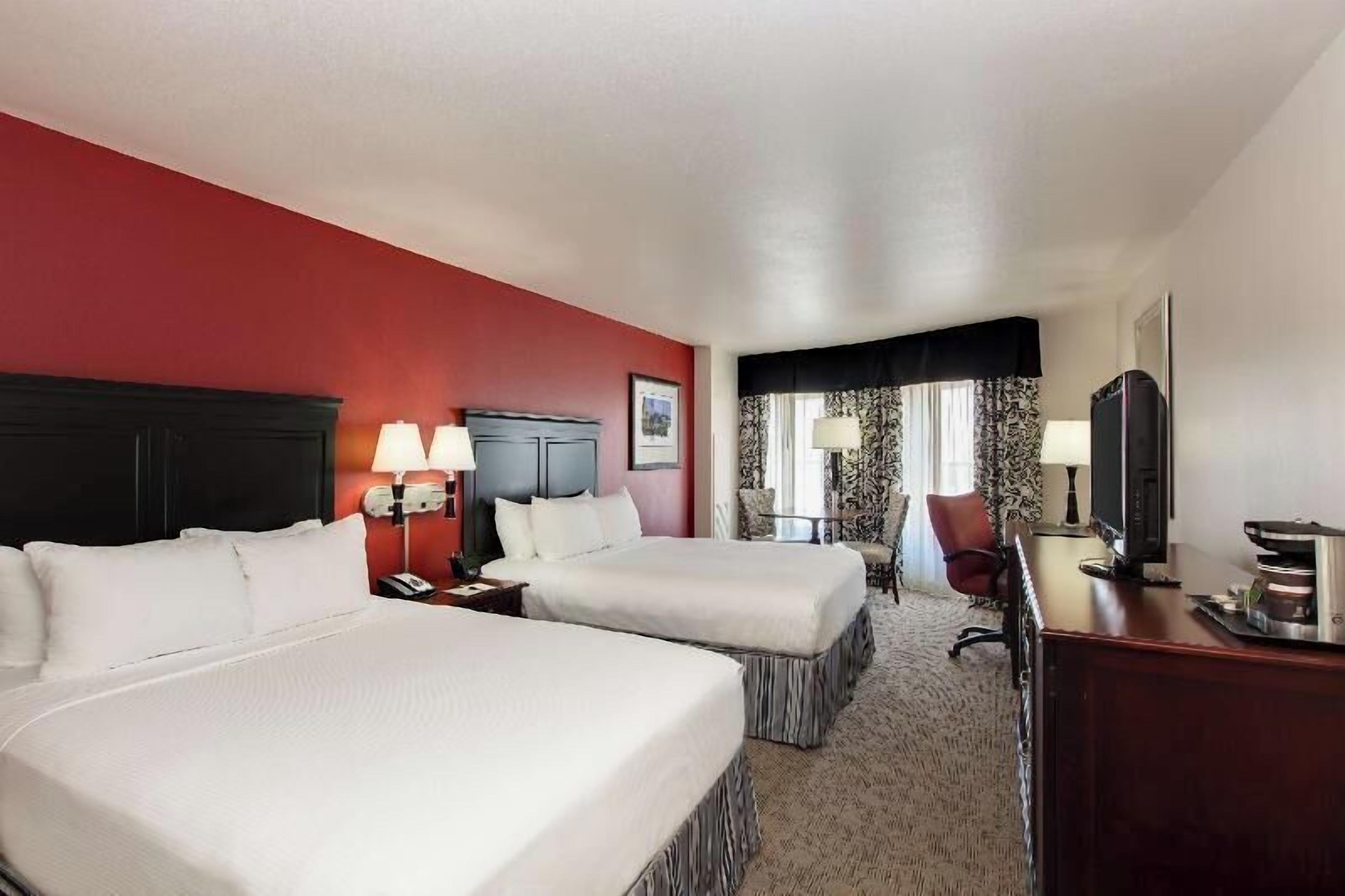 Premium bedding, down comforters, pillowtop beds, in-room safe