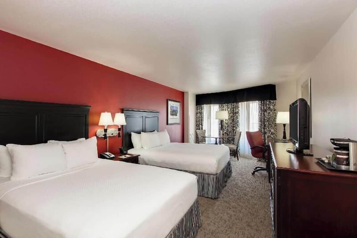 Premium bedding, down duvets, pillow-top beds, in-room safe
