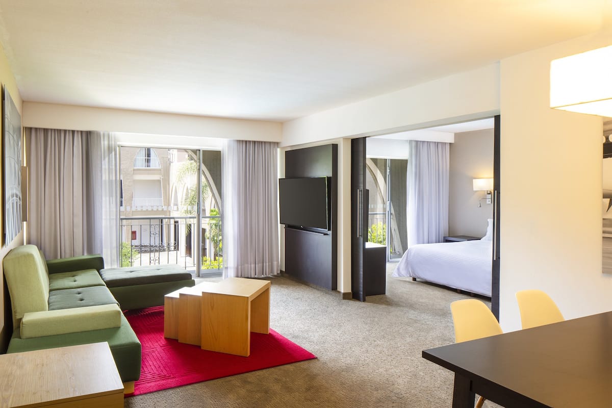 prime suite | hypo-allergenic bedding, in-room safe, desk, blackout curtains