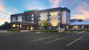 A hotel with a modern design, a parking lot, and a well-maintained landscape. - Garner Hotel Wytheville East by IHG (Wytheville)