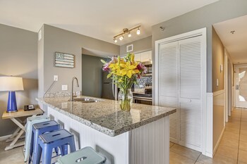 Full-size fridge, microwave, oven, stovetop at Ocean Pointe Suites at Key Largo