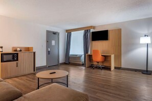 Hypo-allergenic bedding, desk, laptop workspace, blackout curtains