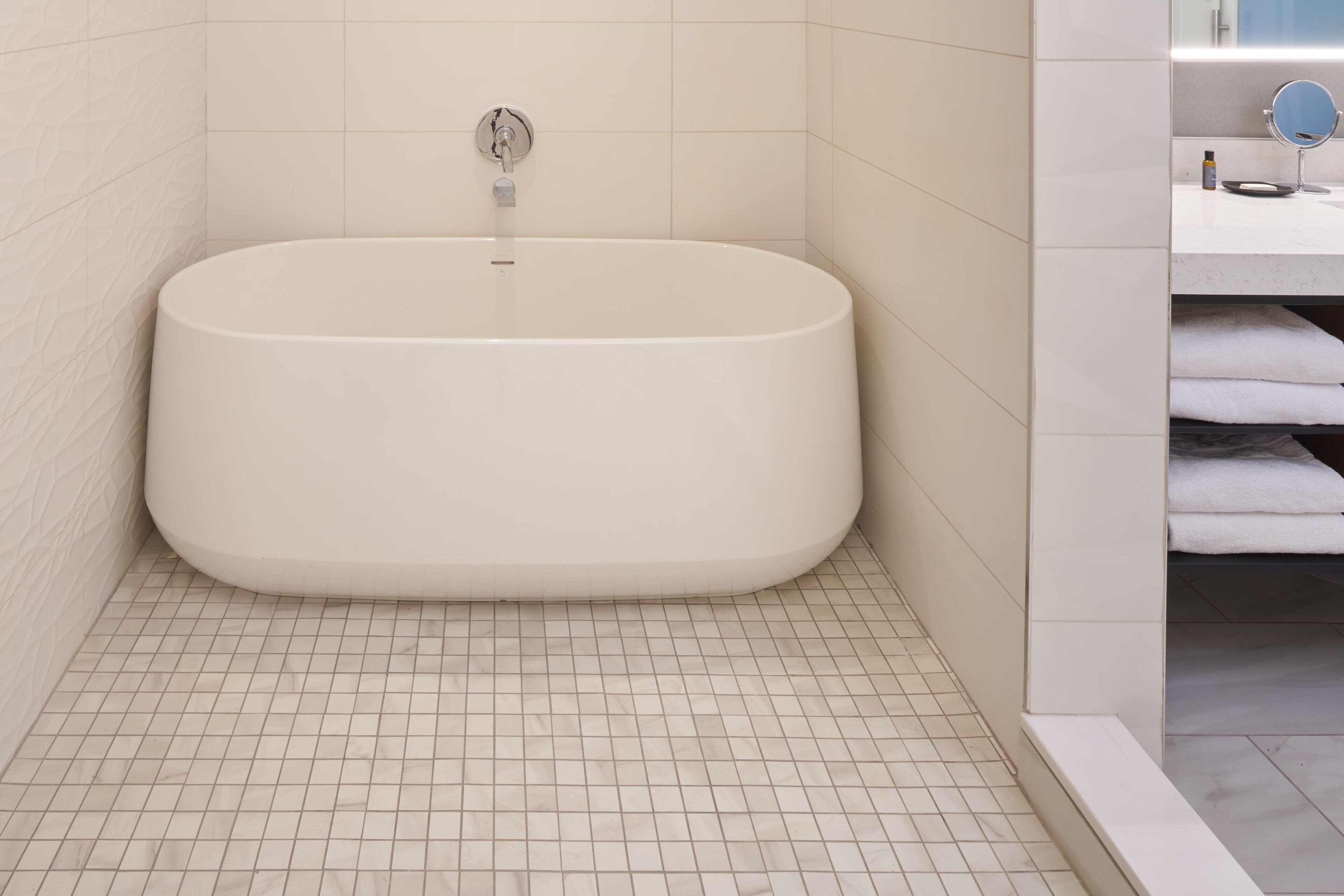 combined shower/bathtub, deep-soaking bathtub, rainfall showerhead