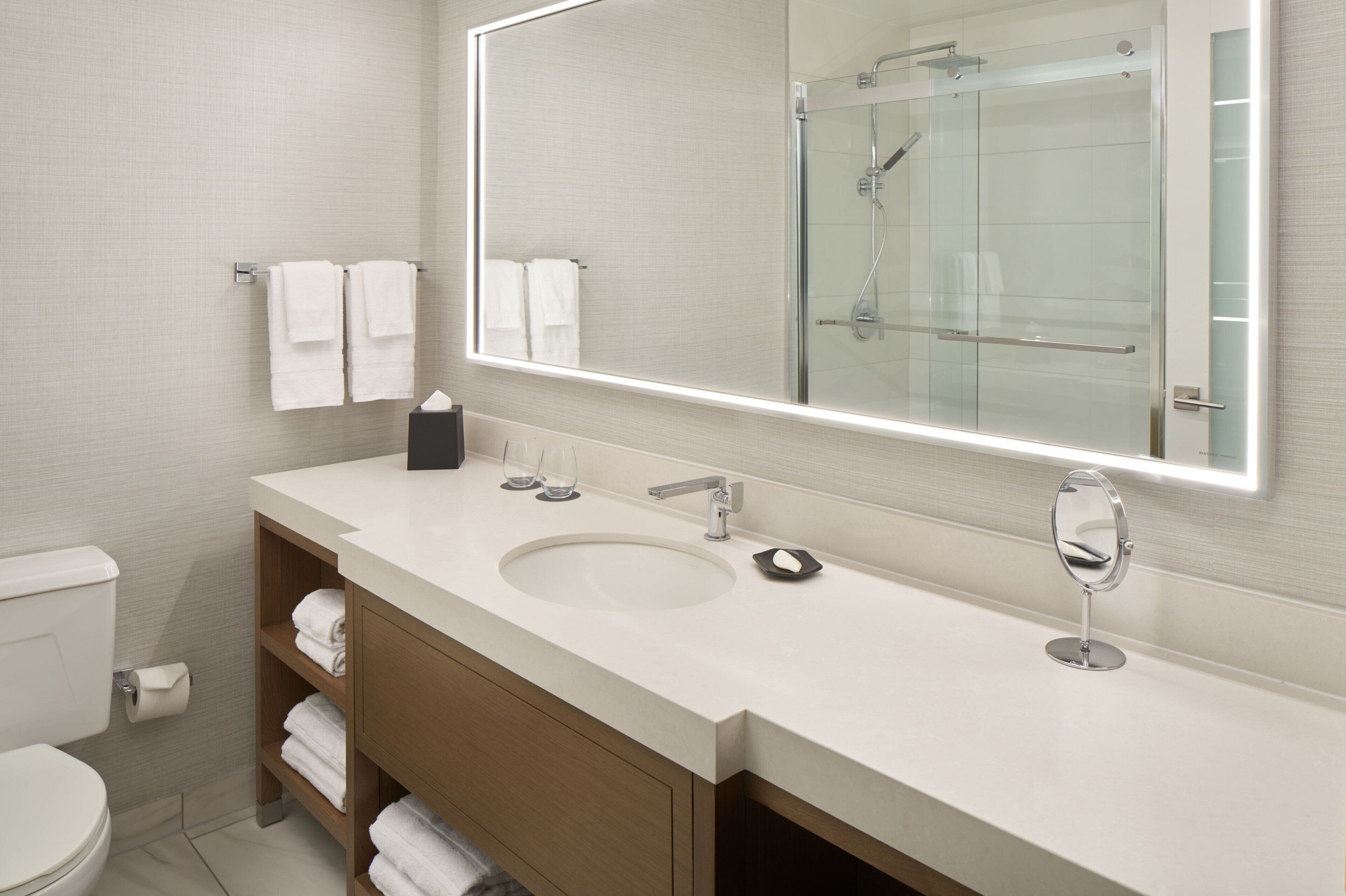 combined shower/bathtub, deep-soaking bathtub, rainfall showerhead