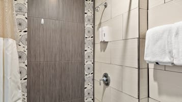 Suite, Multiple Beds, Non Smoking | Bathroom | Shower, free toiletries, hair dryer, towels