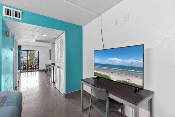 Suite, 1 King Bed, Non Smoking | Premium bedding, desk, laptop workspace, iron/ironing board