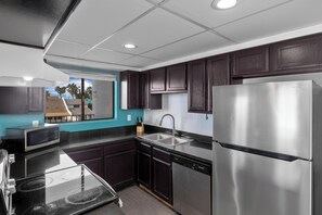 Suite, 2 Queen Beds, Non Smoking | Private kitchen | Fridge, microwave