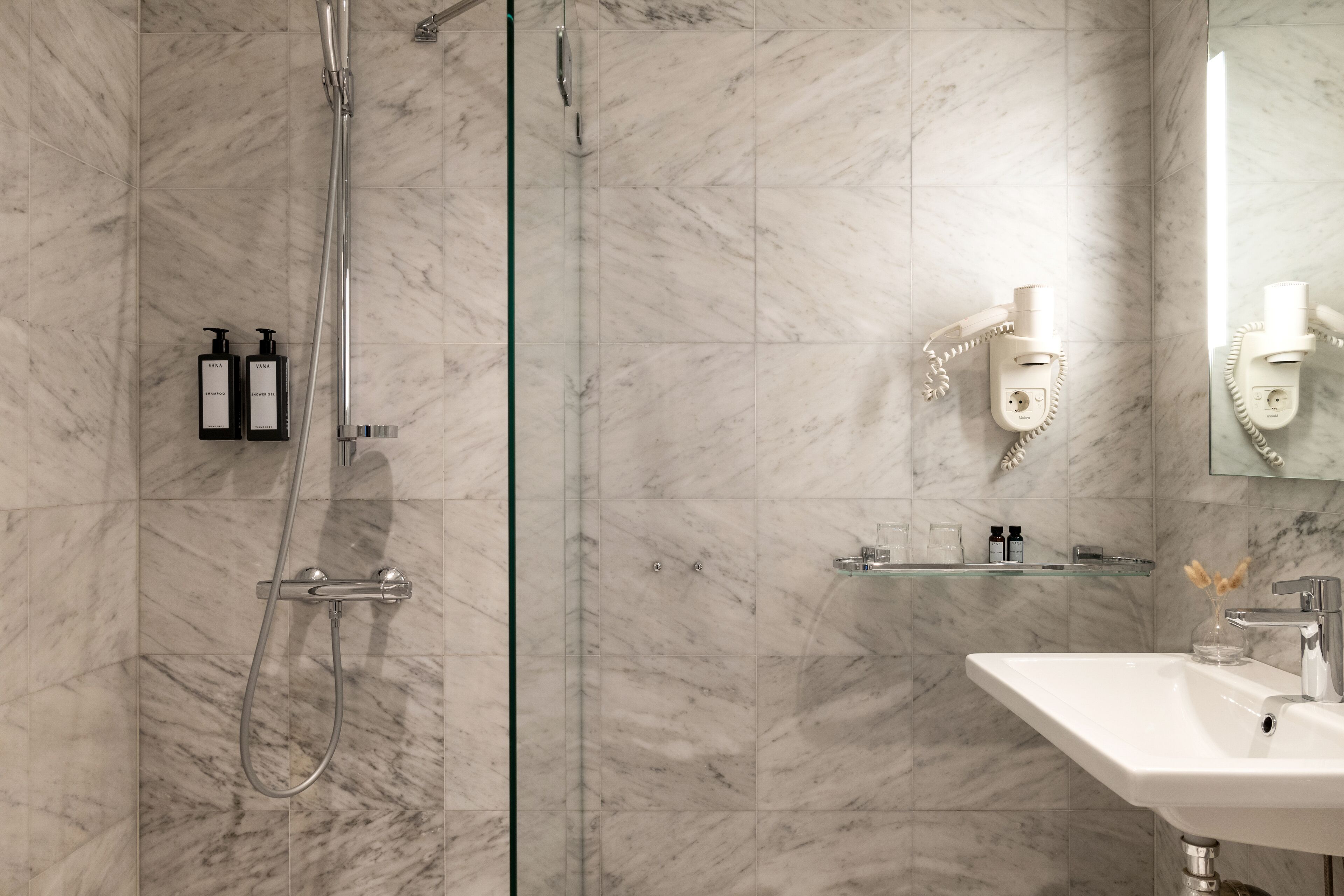 family room | bathroom | eco-friendly toiletries, hair dryer, towels