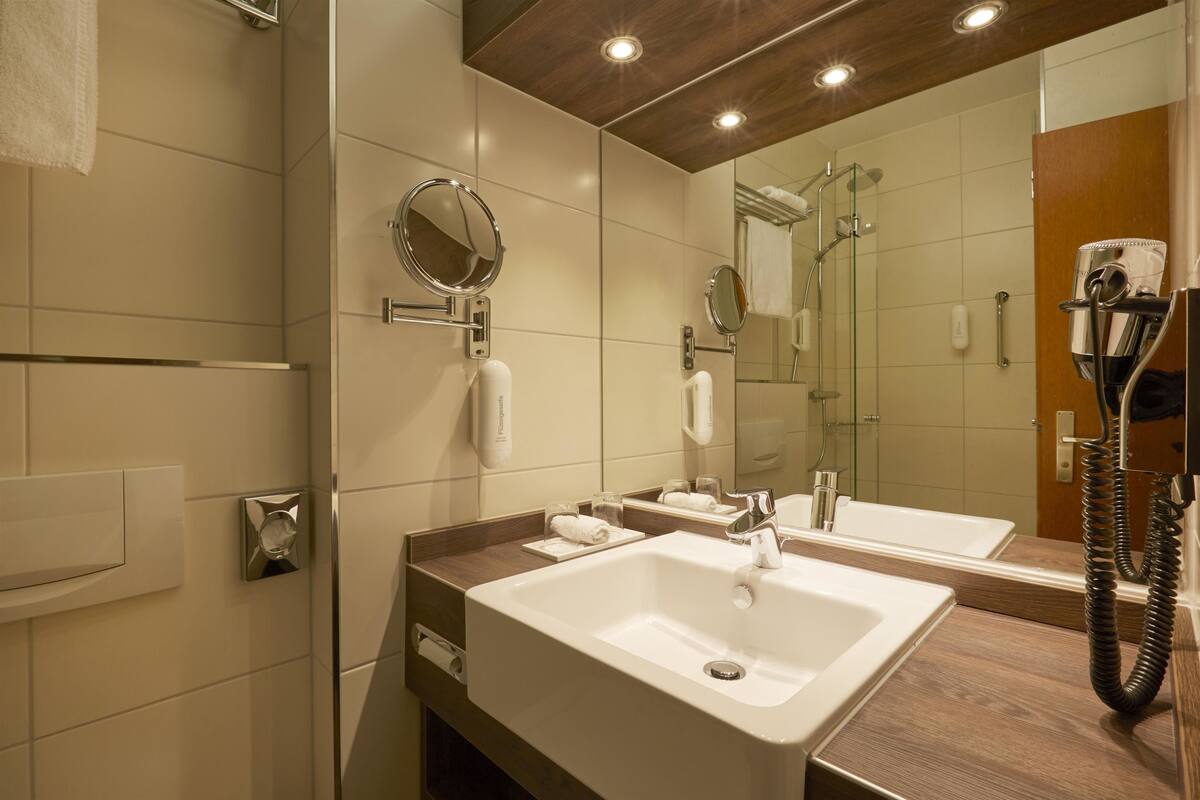 shower, eco-friendly toiletries, hair dryer, towels