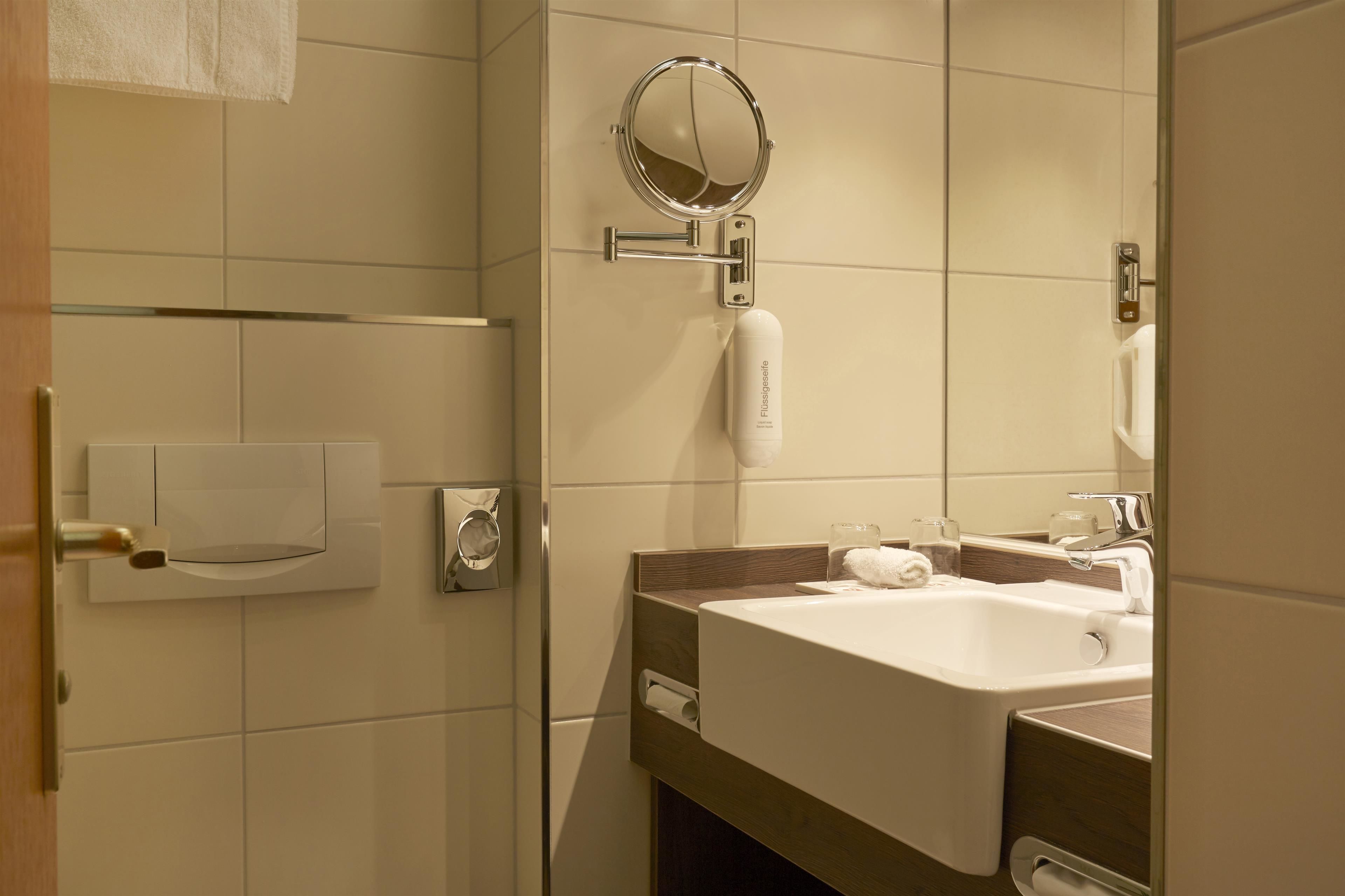 shower, eco-friendly toiletries, hair dryer, towels