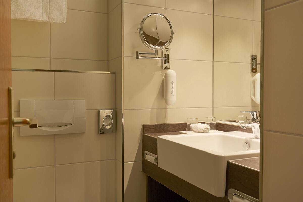 shower, eco-friendly toiletries, hair dryer, towels