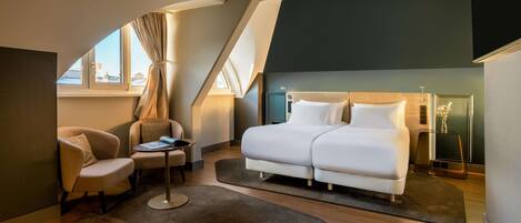 Pillow-top beds, minibar, in-room safe, desk