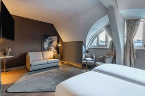 Pillow-top beds, minibar, in-room safe, desk