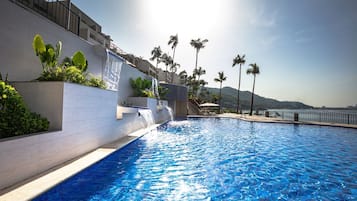 Outdoor pool, open 7:00 AM to 6:00 PM, pool umbrellas, pool loungers