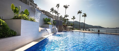 Outdoor pool, open 7:00 AM to 6:00 PM, pool umbrellas, sun loungers