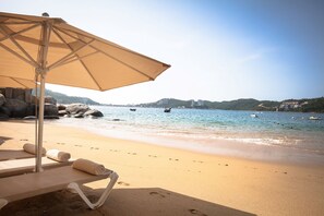 Private beach, sun loungers, beach umbrellas, beach towels