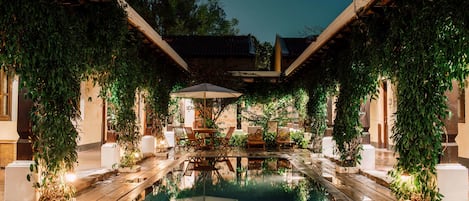 Outdoor pool, pool umbrellas, sun loungers