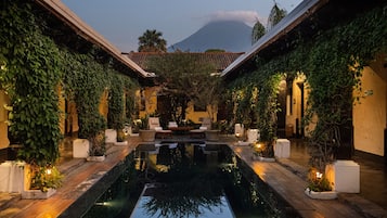 Outdoor pool, pool umbrellas, pool loungers