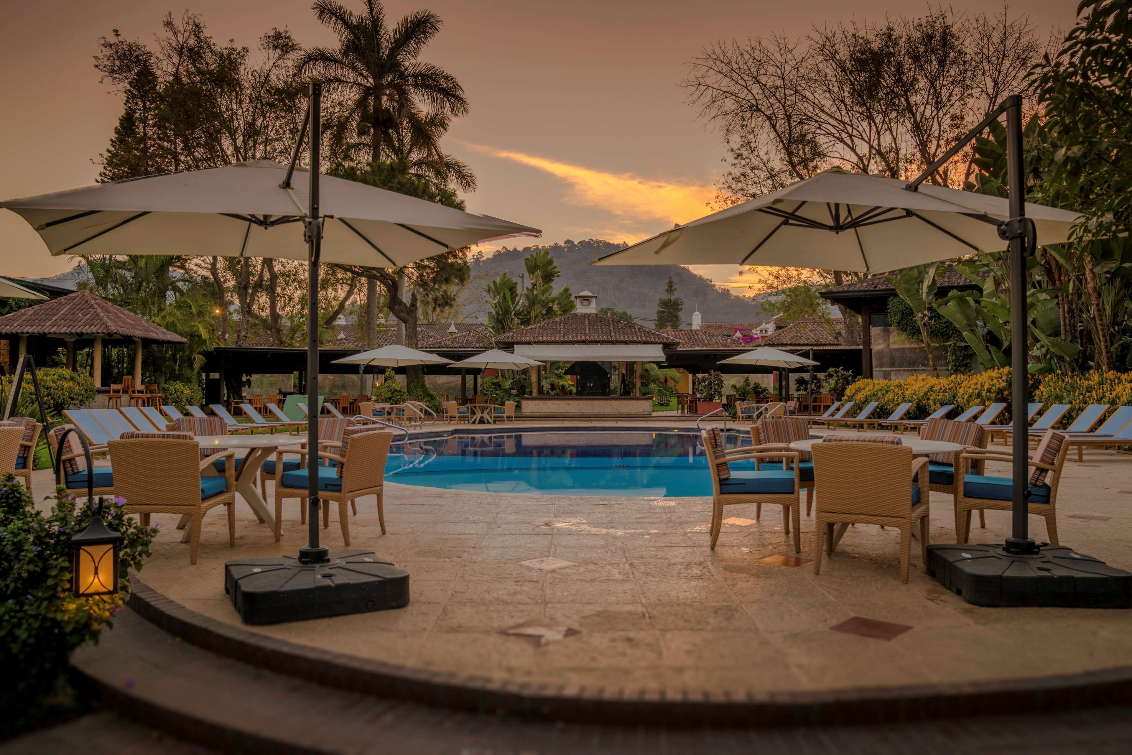 outdoor pool, pool umbrellas, pool loungers